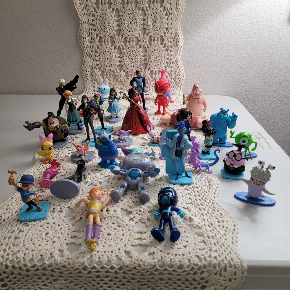 Hodge podge collection of thirty seven (37) action figures and toys.